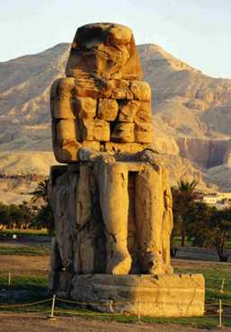 The colossal statue of Amenophis III is one of a pair known as the Colossi of Memnon.