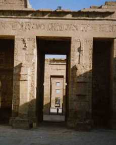 Looking through the temple towards the windowed gateway where Ramses had his pleasure rooms - the small figure gives an idea of the scale of the temple.