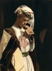 playing a small flute